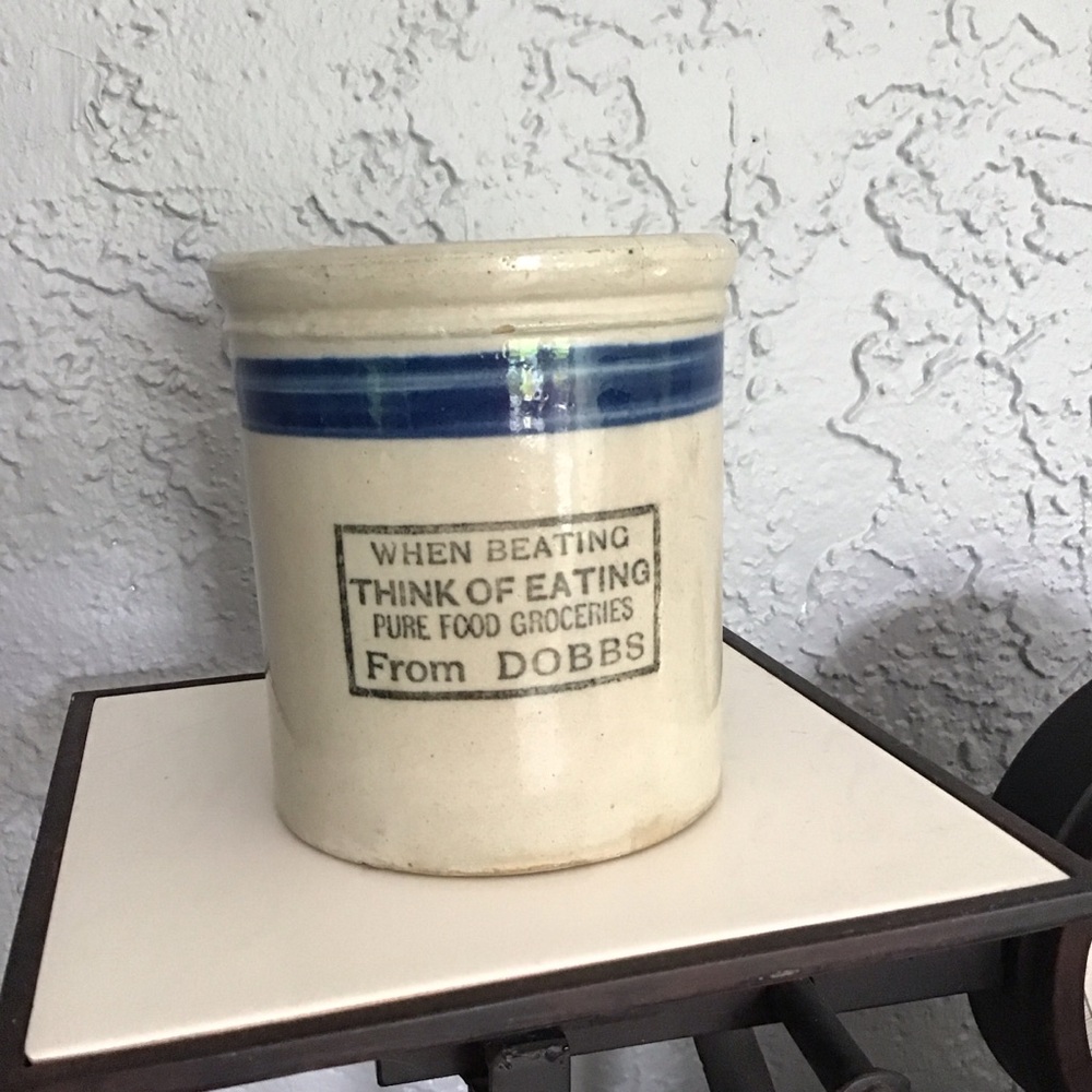 Stoneware pint beater jar with advertising for Dobbs. In very nice condition